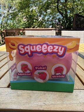 Squeezy Pink Kids Toy by - Squeeze, Poke & Stretch Fun